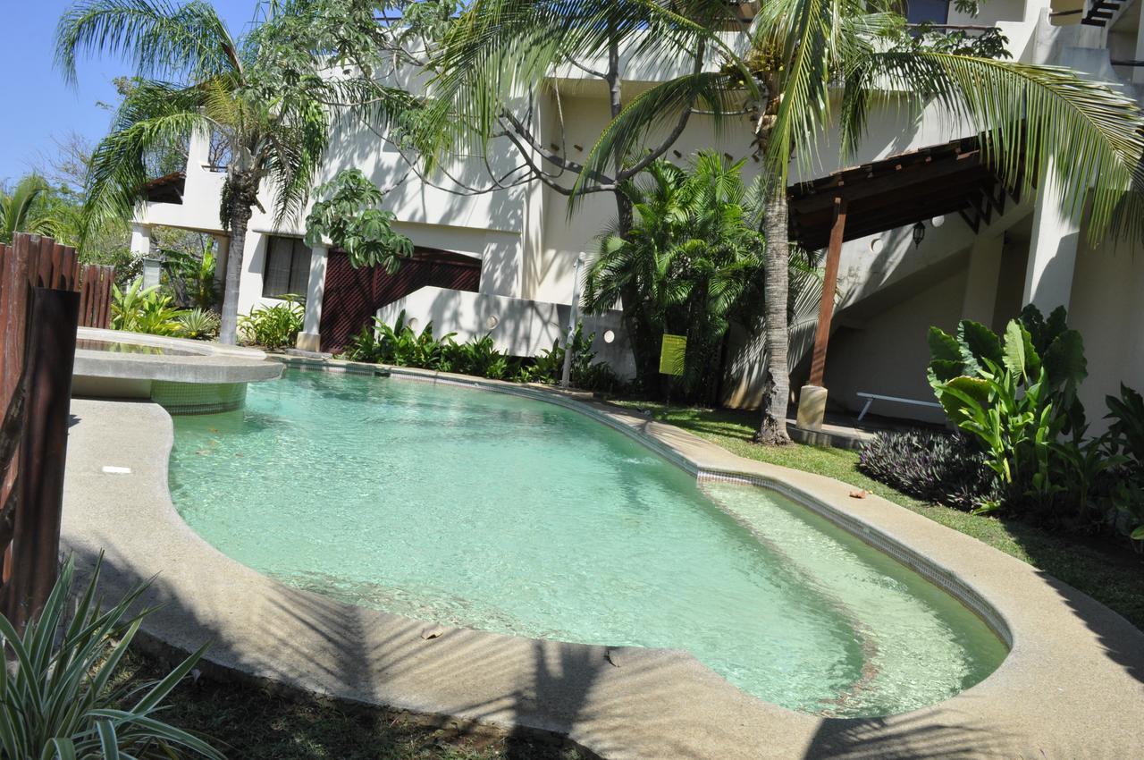 Tropical Gardens Suites And Apartments Coco Exterior foto